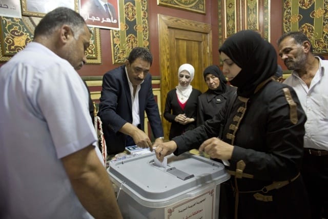 U volebni urny v Syrii